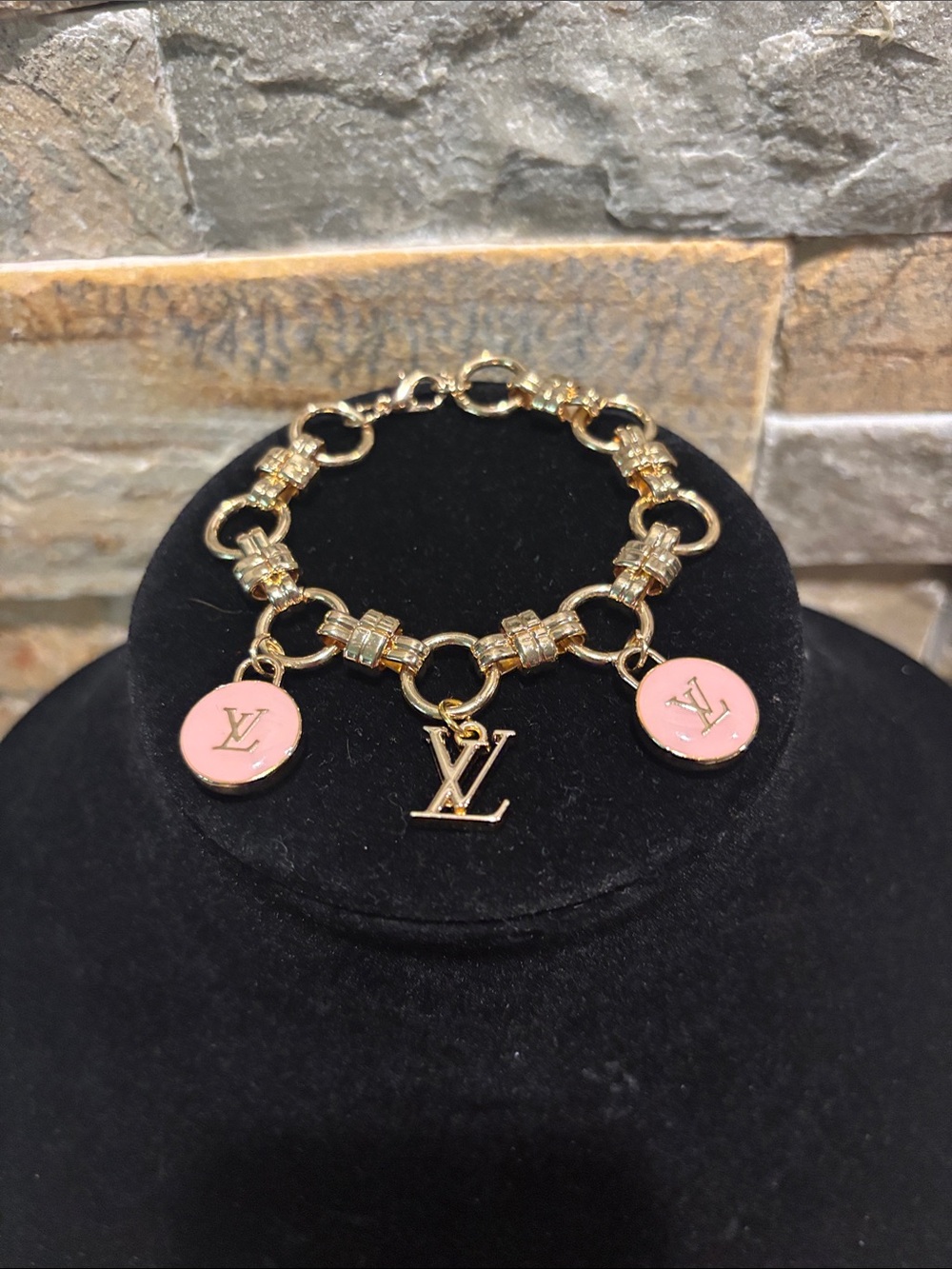 Gold-Tone Bracelet with Pink Enamel LV & LV logo Charm